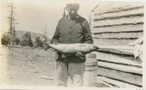 Image of Brook trout held by Abie